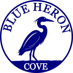 A blue heron is depicted in a circular logo with the words "Blue Heron Cove" written around it.